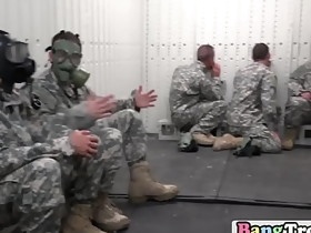 Soldiers go into the locker room to suck through glory holes