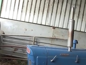 Skinny young gay shoots jizz over farm equipment after anal